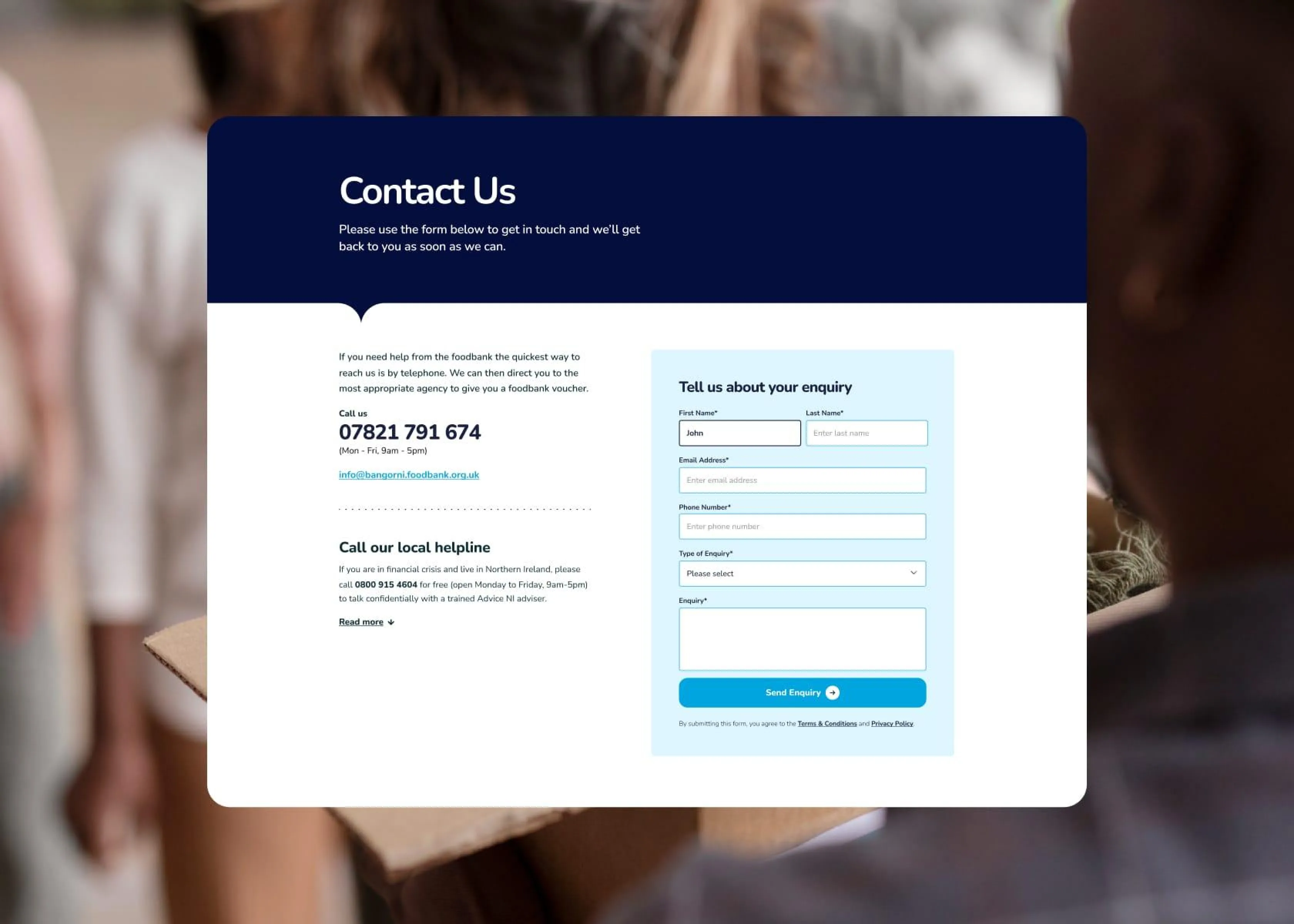 Contact page with phone details and an enquiry form displayed over a blurred background of people carrying boxes.