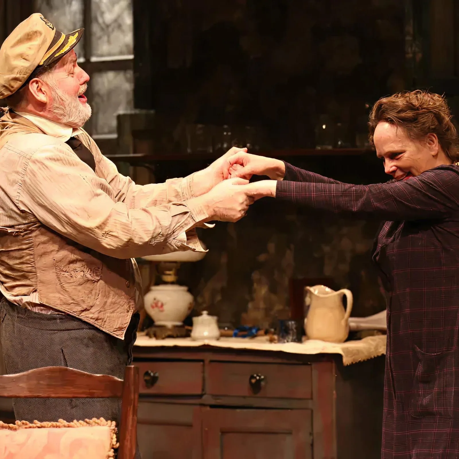 Two theatre performers acting on stage